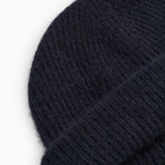 Atlas Kashmir hue in dark indigo with visible knitted rib texture
