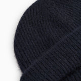 Atlas Kashmir hue in dark indigo with visible knitted rib texture