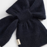 Dark indigo cashmere scarf with knot and small logo tag