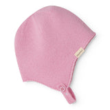 Pink baby hat in knit with button and front drawstring.