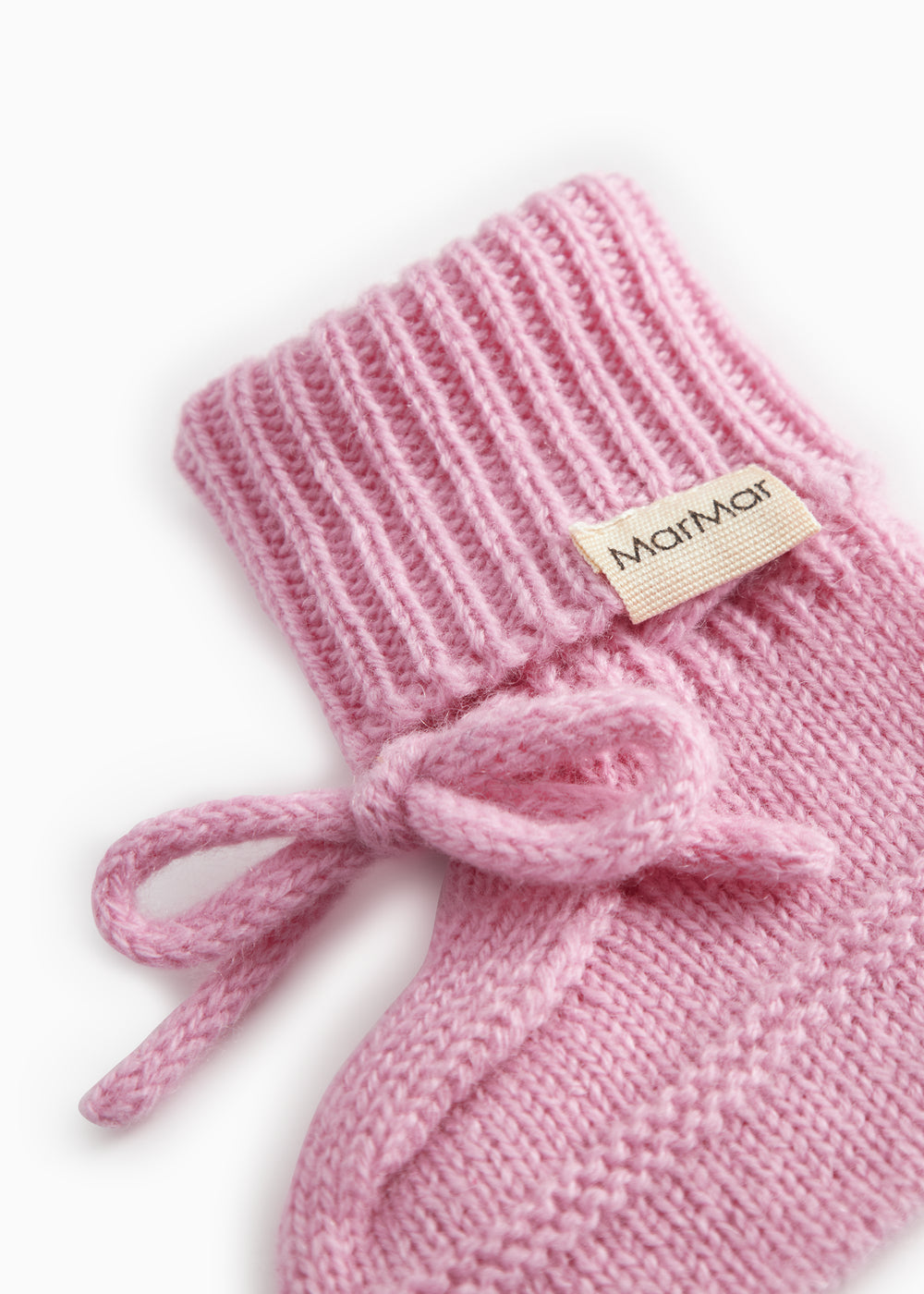 Pink knitted baby onesies with ribbed edge and MarMar brand, tied bow.