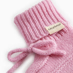 Pink knitted baby onesies with ribbed edge and MarMar brand, tied bow.
