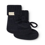 Indigo knitted baby socks with a knot band and MarMar brand, side view.