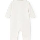 Ricci heldrag in light off-white set with long sleeves and pant closure.