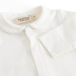 Ricci blouse in light off-white with a picot edge collar and button detail at the neck.