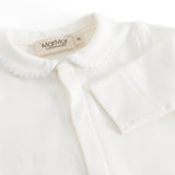 Ricci blouse in light off-white with a picot edge collar and button detail at the neck.
