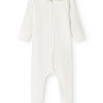 Cream-colored dress with long sleeves and legs with feet, plus a bacon edge at the neckline.