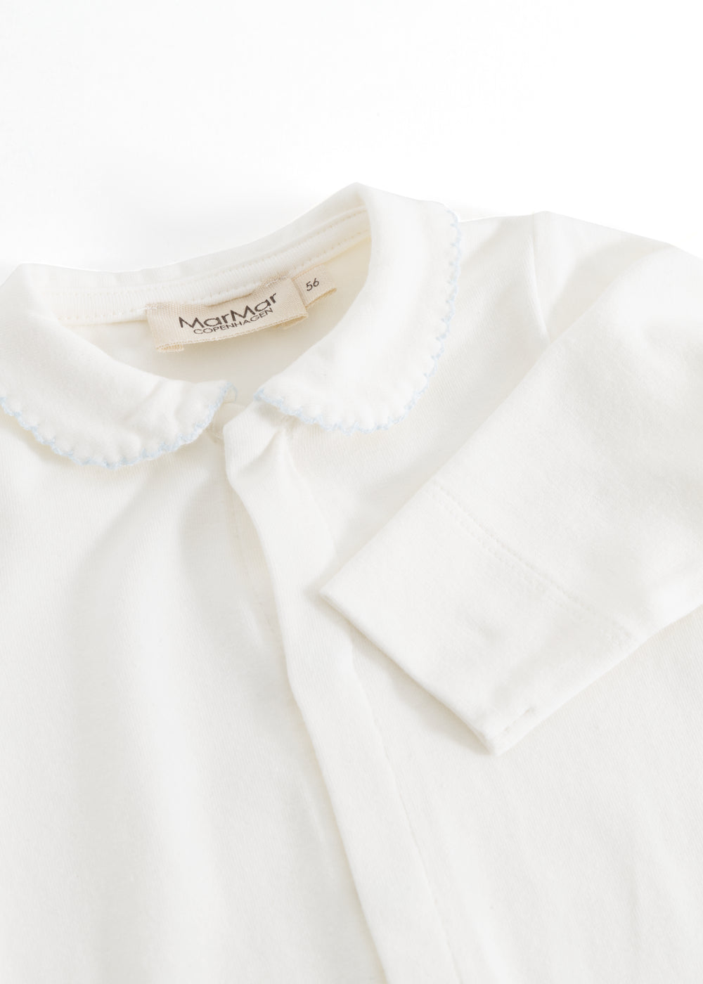 Baby ones with white collar edge and discreet blue picot trim.