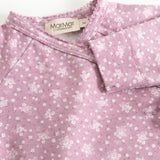 Pink wrap blouse with floral print and MarMar Copenhagen branding at the collar
