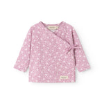 Pink blouse with long sleeves, floral print and wrap closure with tie belt.