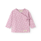 Pink blouse with long sleeves, floral print and wrap closure with tie belt.