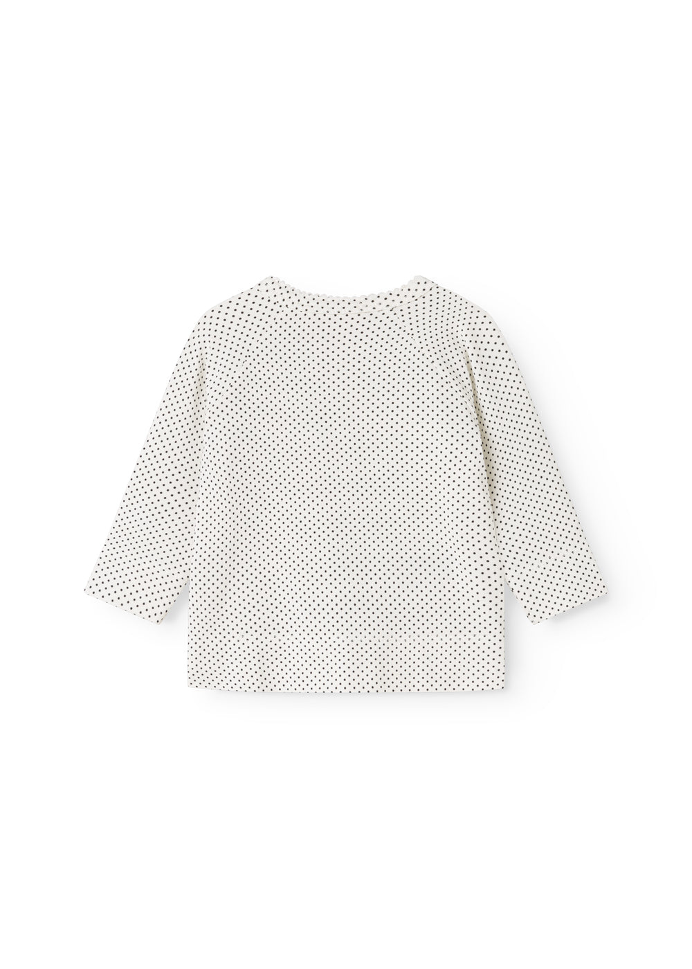 White blouse for baby with small black dots and long sleeves