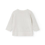 White blouse for baby with small black dots and long sleeves