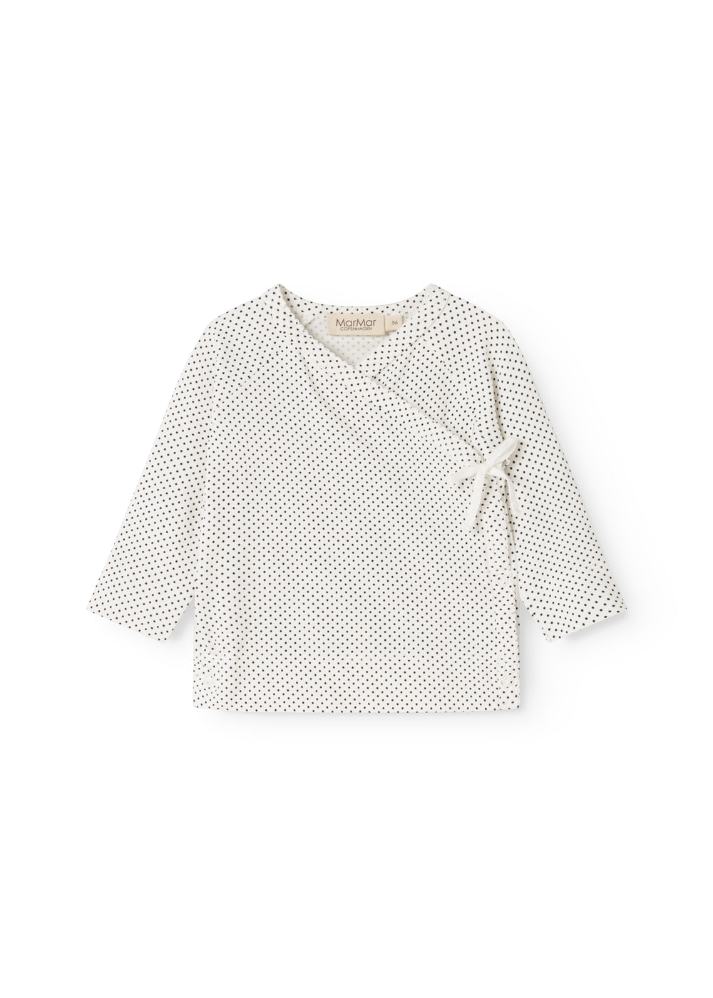 White blouse for baby with small black dots, round collar and front tie.