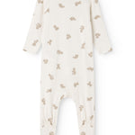 White dress with beige teddy bear print, long sleeves and round neck.