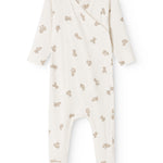 White dress with a beige teddy bear print all over and a crossed neckline.
