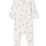 White dress with a beige teddy bear print all over and a crossed neckline.
