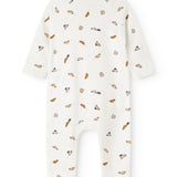 White jumpsuit with long sleeves and legs, pattern of colorful cars everywhere.