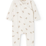 White dress with teddy pattern, cross neckline.