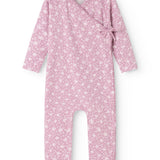 Pink dress from Rula with small white floral print, button closure and long sleeves.