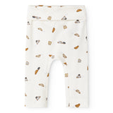 White baby pants with cars in a repeated pattern, stretchy and straight leg.
