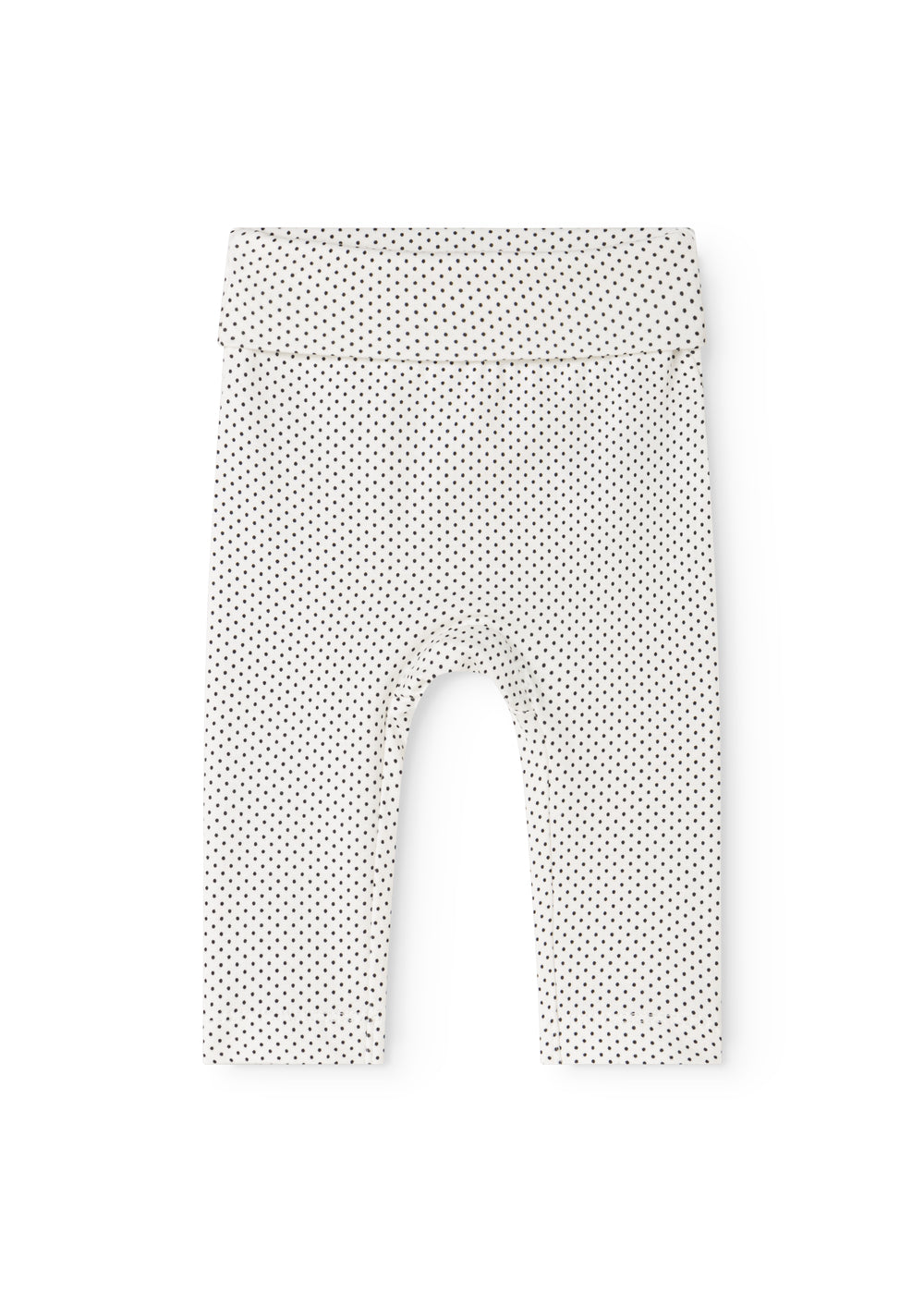 Baby shorts in a light color with small black dots and an elastic waistband.