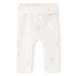 Piva baby shorts in light cream with colorful small animal print and elastic waistband.
