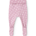 Pink trousers with small white flower print and elastic waistband