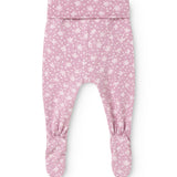 Pink trousers with small white flower print and elastic waistband