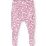 Pink trousers with small white flower print and foot closure.
