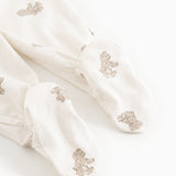 Baby tights with teddy bear print and elastic cuffs at the ankles.