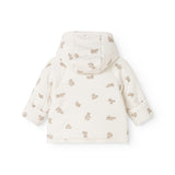 Hooded winter jacket in cream with teddy bear print all the way on the back.