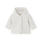 White children's jacket with hood, small black dots, snap closure and long sleeves