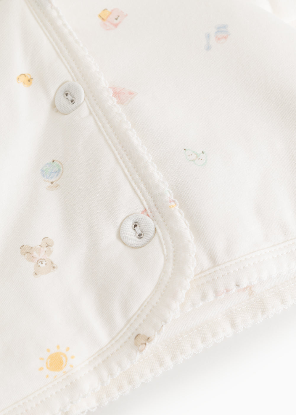 Printed hooded jacket with snap buttons and wavy front edge