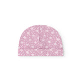 Pink baby onesie/cap with small white flower print and vertical stitching at the front