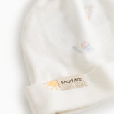 White baby hoodie with knot and elastic edge, featuring the MatMar brand label on the strap.