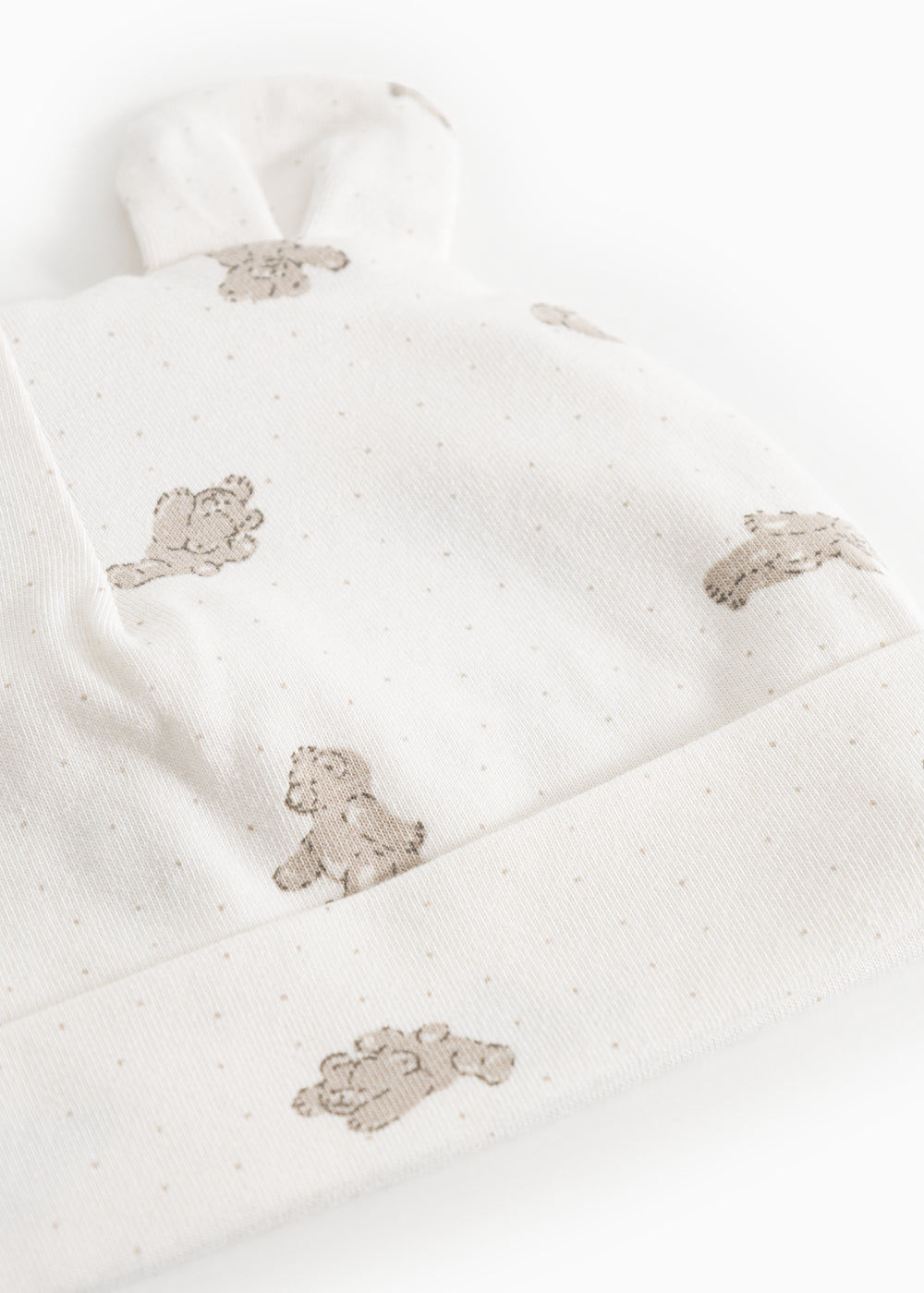 White baby hue with small teddy bear print