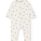 Light off-white dress with all-over teddy bear print and long sleeves, button closure.