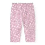 Pink pants with elastic waist and small star flowers on the back.