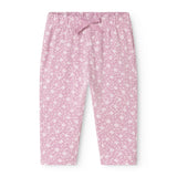 Pink pants for baby with small star flowers and elastic waistband in front.
