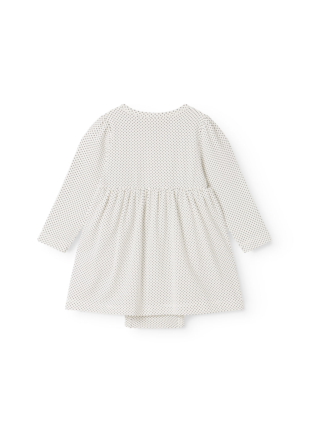 White dress with small black dots, long sleeves and a pleated wide skirt.