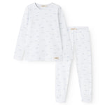 White children's pajamas with long sleeves and trousers, blue whales everywhere.