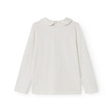 White long-sleeve t‑shirt with small black dots and a round neck.