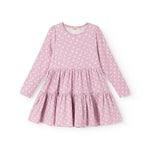 Lilac/pink dress with small white flowers, long sleeves and a ruffled skirt.