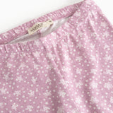 Pink leggings with small floral print and elastic waistband