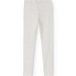 White leggings with small black dots, straight fit and elastic waist.