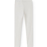 White leggings with small black dots, straight fit and elastic waist.