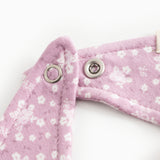 Strap with pink fabric and white pattern with push buttons