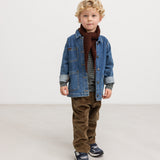 Dark wine-red scarf for child, worn under a blue denim jacket.