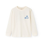 Long-sleeve blouse in cream with a blue "Hello" print on the chest.